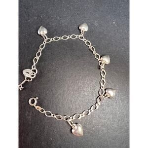 Vintage sterling silver puffy hearts lock and key charm bracelet 7.5 inch
